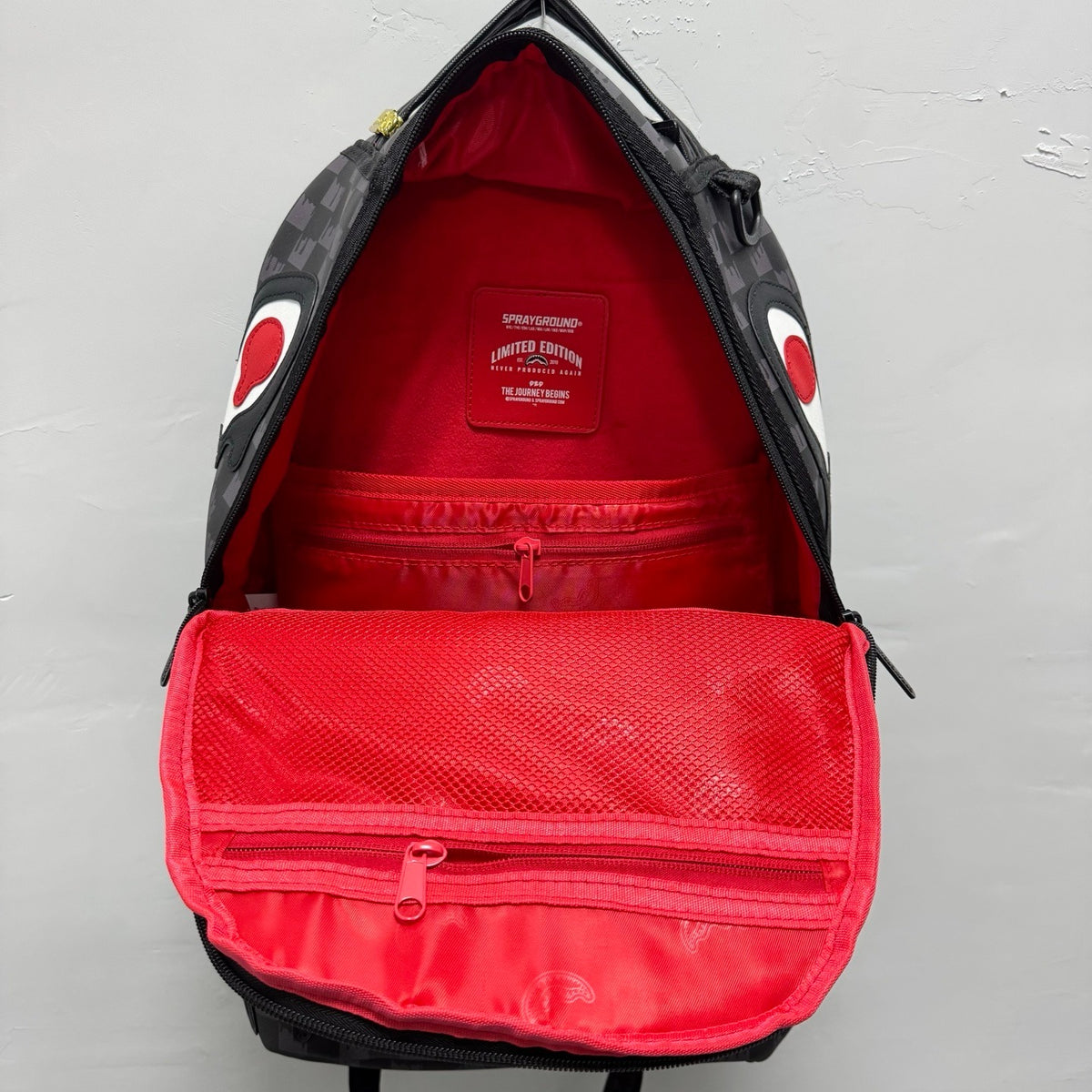 Sprayground Grey Checkered Drip Sharkmouth Backpack