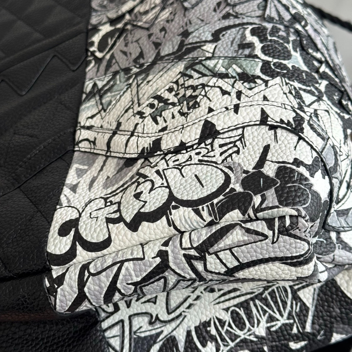 Sprayground Black & White Graffiti Backpack