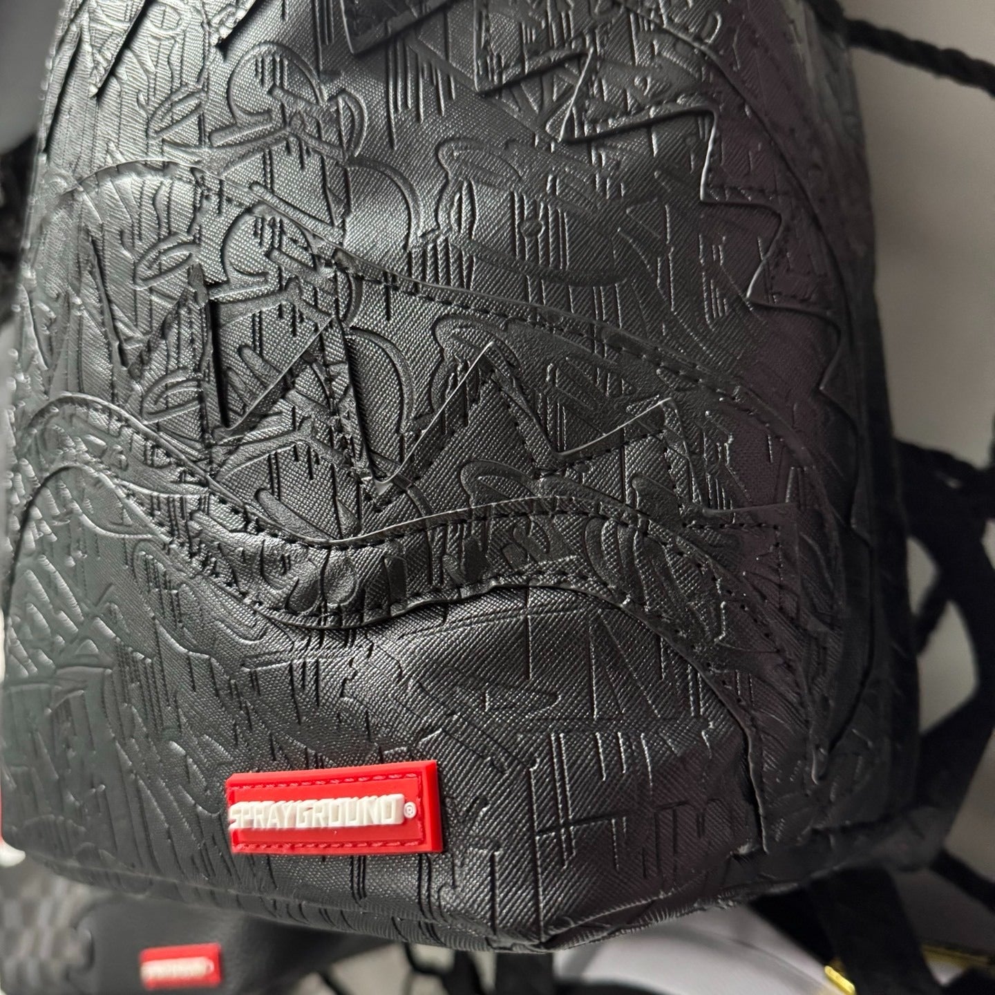 Sprayground Blackout Embossed Shark Backpack