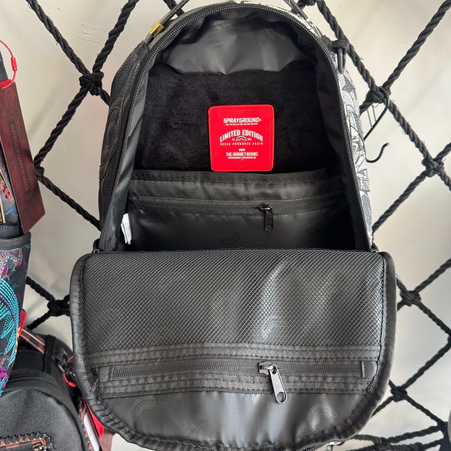 Sprayground Black & White Graffiti Backpack