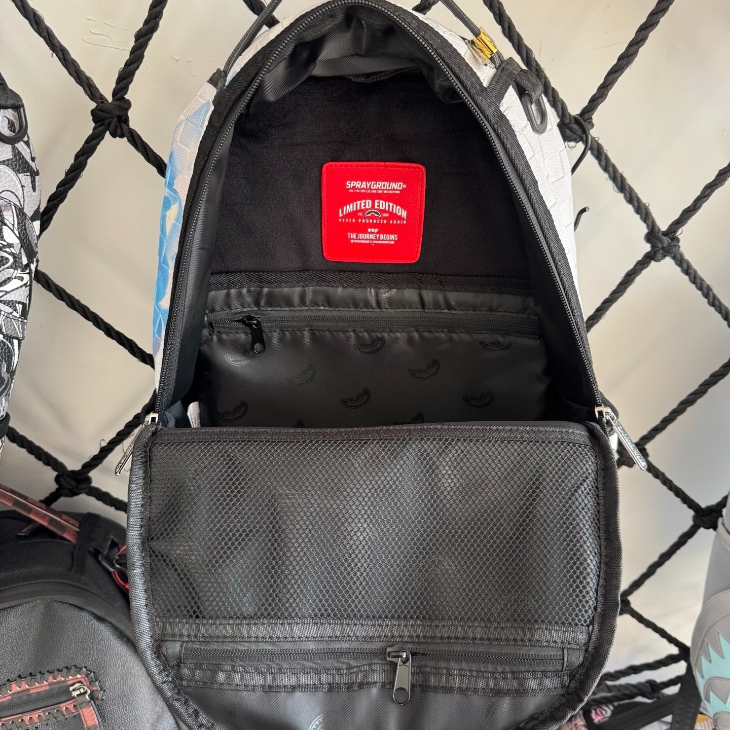 Sprayground Clouds Checkerboard Shark Backpack